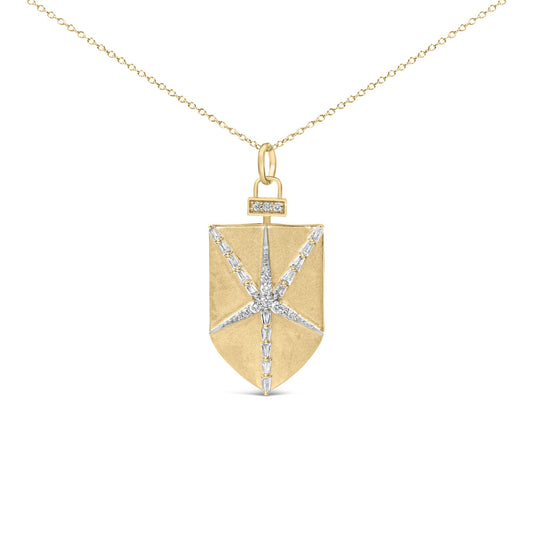 Close-up front view of a yellow metal necklace with a rectangular pendant featuring a starburst design made of white round and baguette-shaped gemstones, shown on a white background.