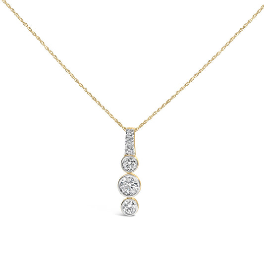 Front view of 14K yellow gold bezel set 1/7 cttw diamond vertical bar pendant necklace with three round diamonds