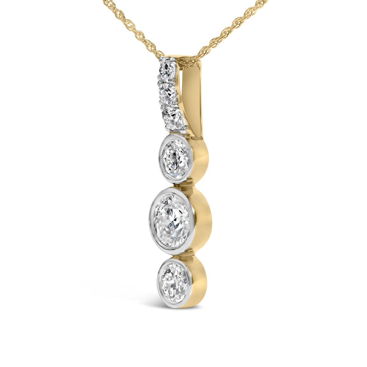 Angled close-up of yellow gold-plated vertical pendant with bezel-set and prong-set lab-grown diamonds