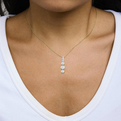 Vertical lab-grown diamond pendant necklace shown worn on a model