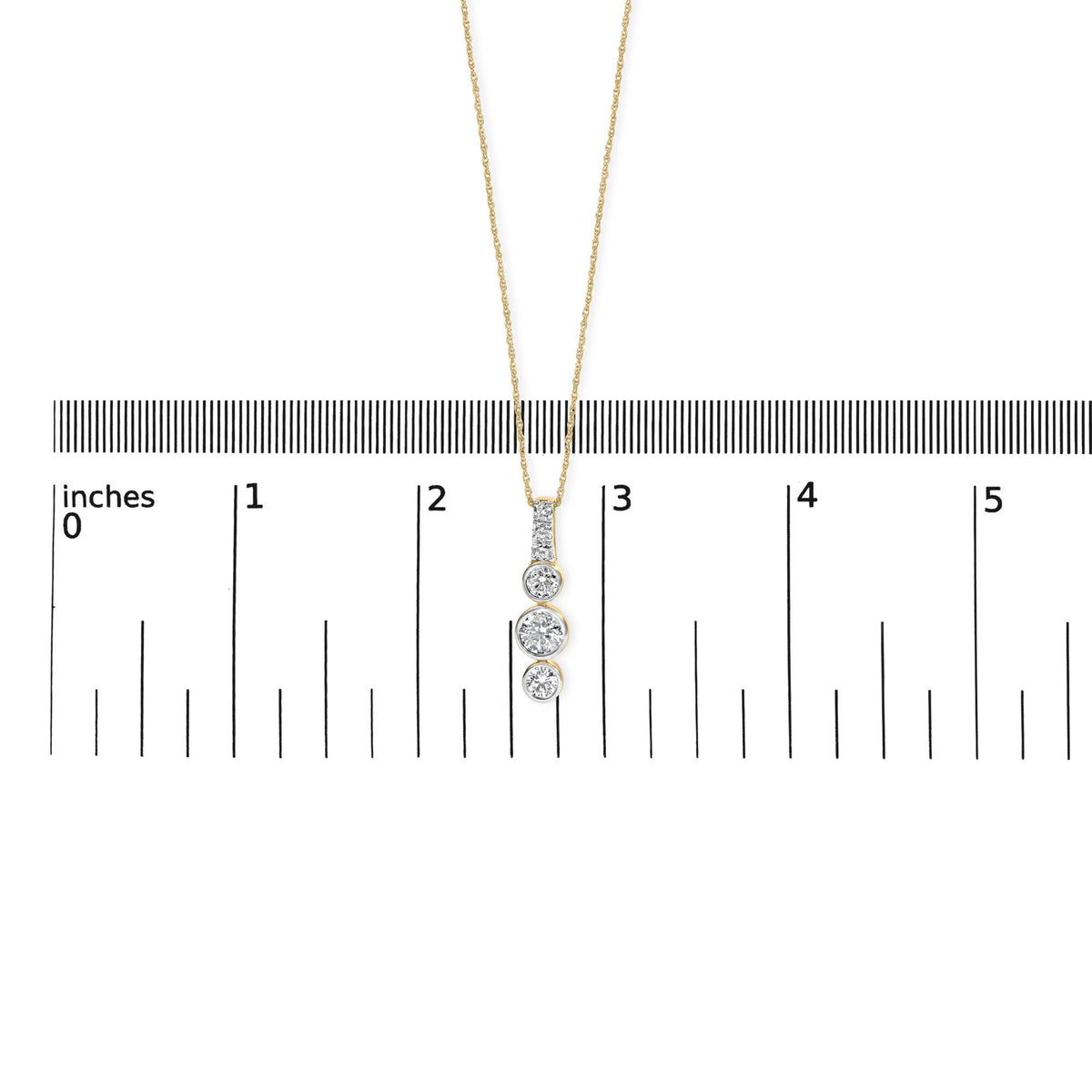 Vertical lab-grown diamond pendant necklace shown with scale reference