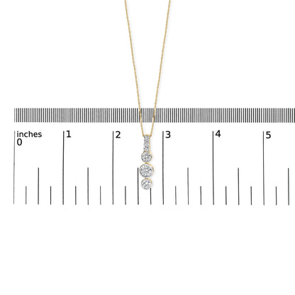 Vertical lab-grown diamond pendant necklace shown with scale reference