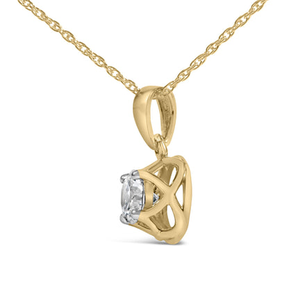 Close-up front view of a yellow metal necklace with a pendant featuring a white round gemstone in prong setting.