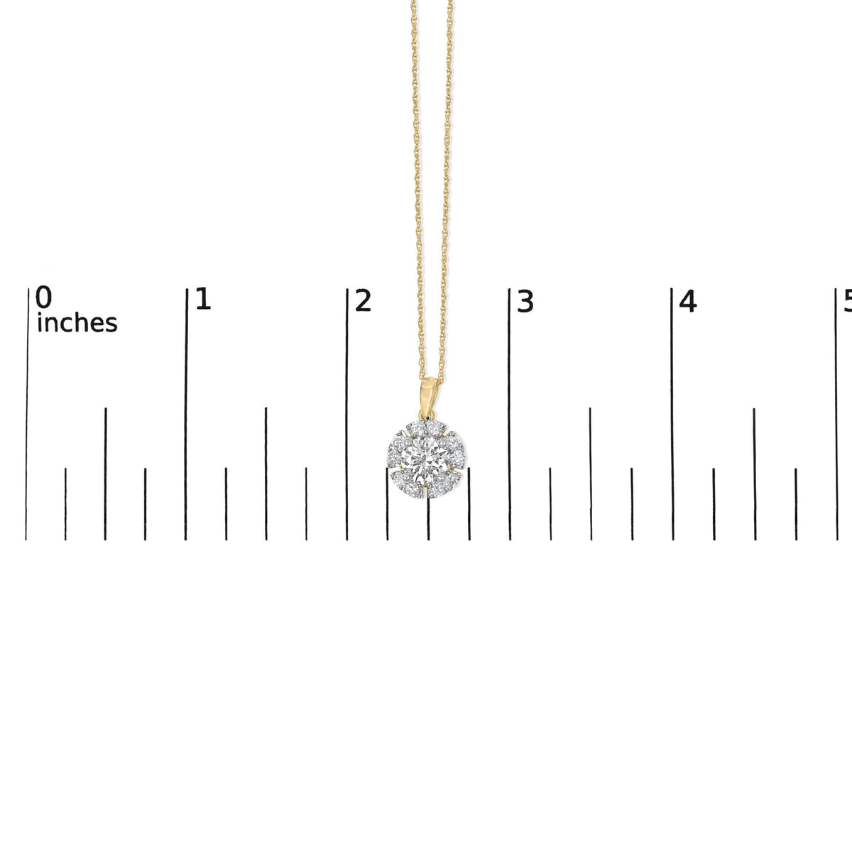 Close-up front view of a yellow metal necklace with a pendant featuring a circular cluster of round white gemstones, shown on a scale.