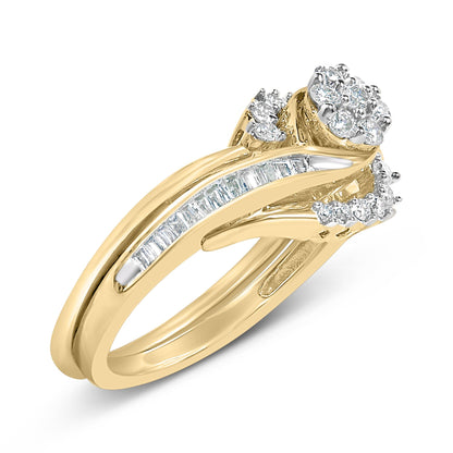 Close-up of a yellow and white metal ring with channel-set white baguette gemstones along the band and clusters of round white gemstones in prong settings on top, shown at an angled side view.