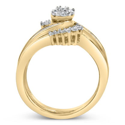 Close-up side angle of a yellow and white metal ring featuring a cluster of white round gemstones in prong settings and a row of white baguette gemstones in channel setting along the band.
