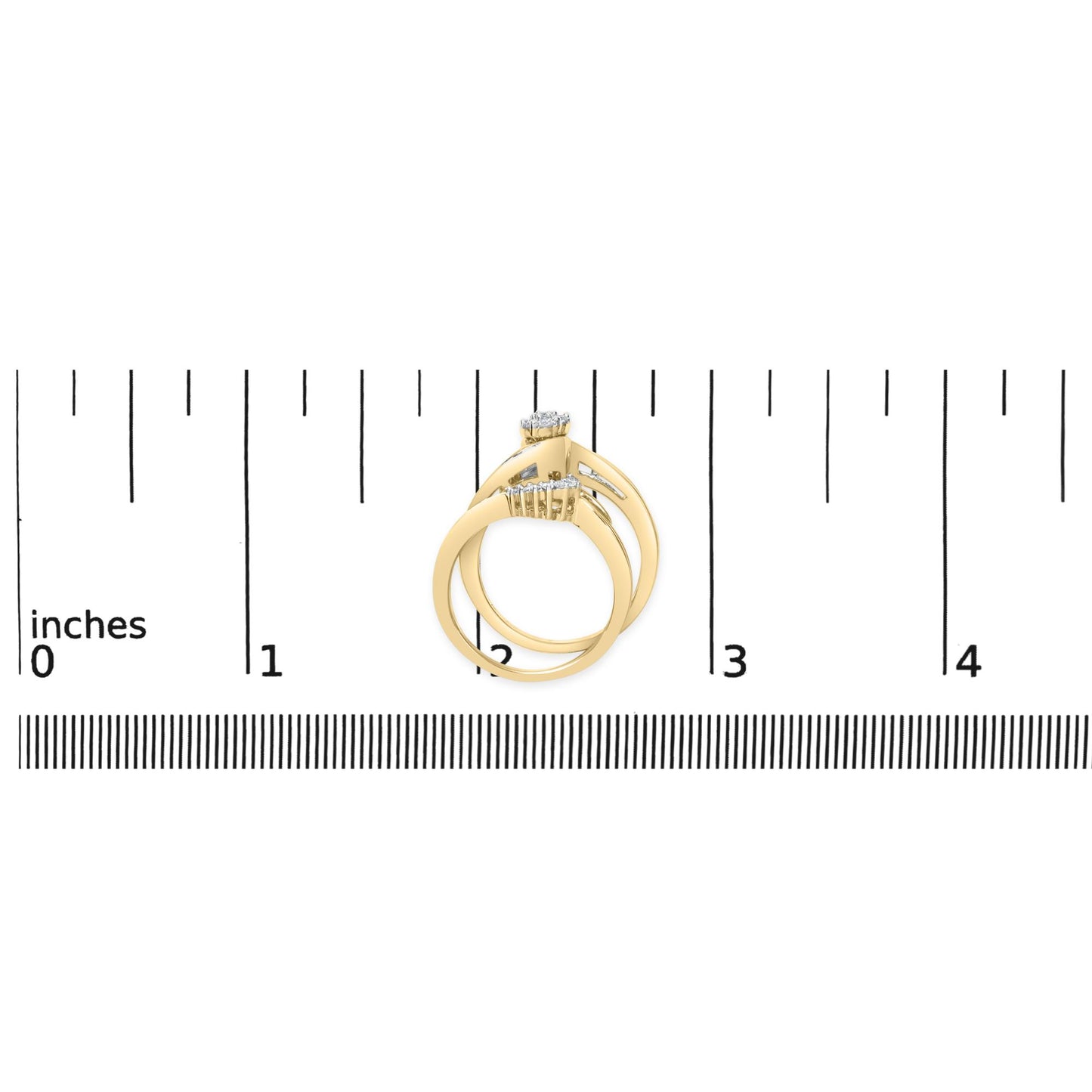 Two rings shown on a scale, photographed from above. Each ring features a yellow and white metal band with white round gemstones in prong settings and white baguette gemstones in channel settings.
