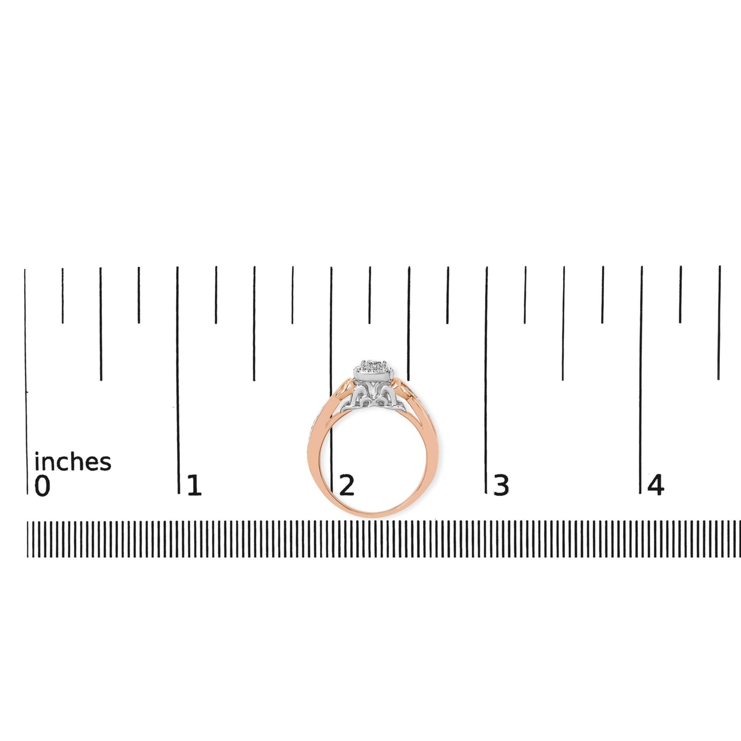 Ring with white and rose metal shown on a ruler scale, side view, featuring round white gemstones in a prong setting on top.