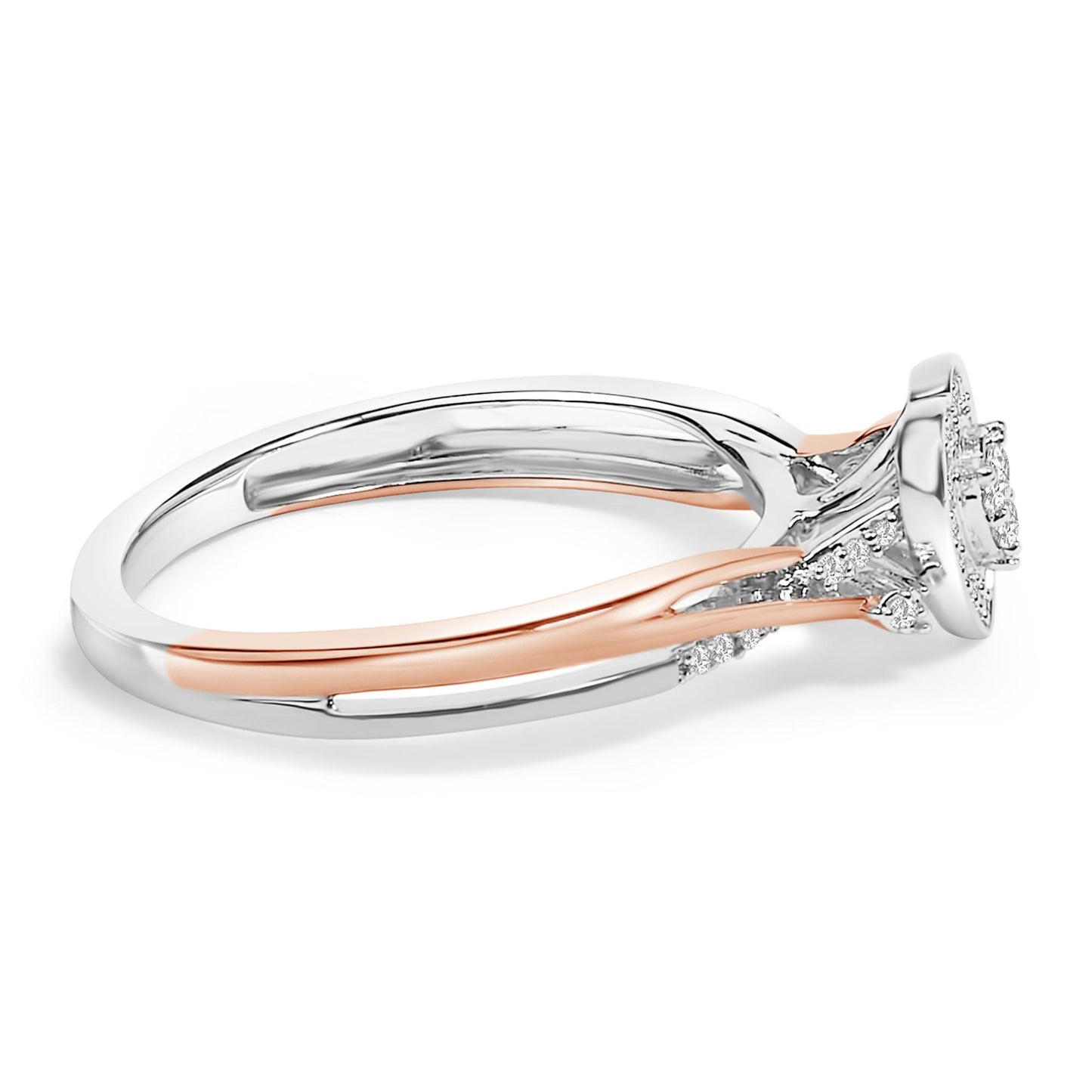 Close-up side angle of a ring with intertwined white and rose metal bands, featuring a round cluster of white gemstones in prong settings on top.