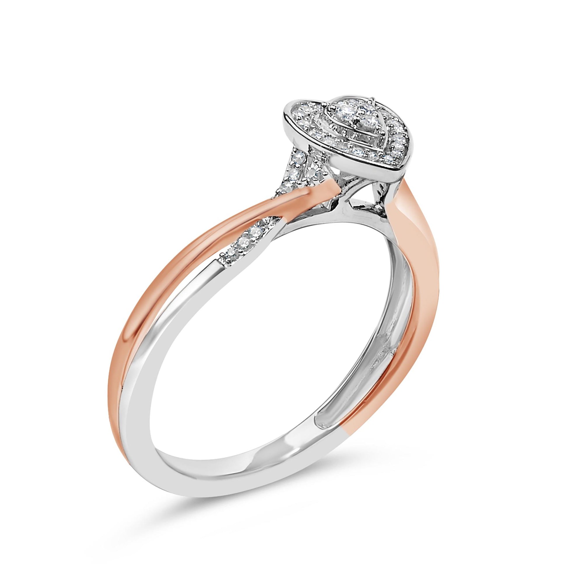 Ring with white and rose metal colors shown at an angled close-up view, featuring a pear-shaped cluster of round white gemstones in prong settings atop the band.