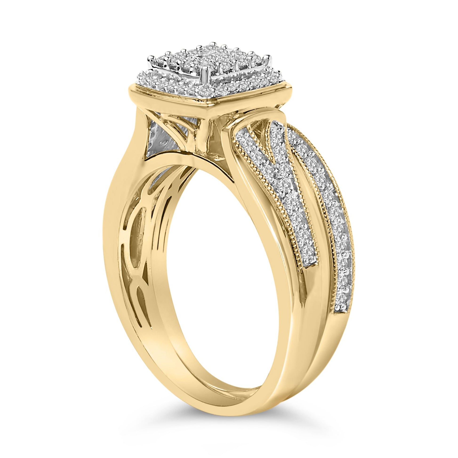 Side angled close-up of a yellow and white metal ring featuring a square cluster of white round gemstones in prong settings on top and decorative white gemstones along the shoulders.