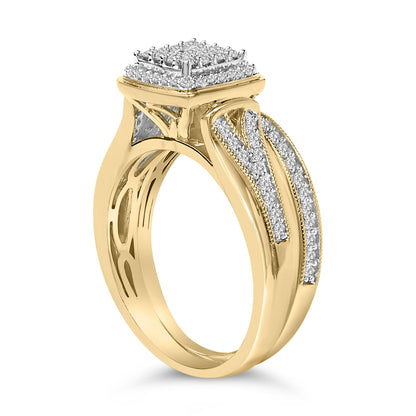 Side angled close-up of a yellow and white metal ring featuring a square cluster of white round gemstones in prong settings on top and decorative white gemstones along the shoulders.