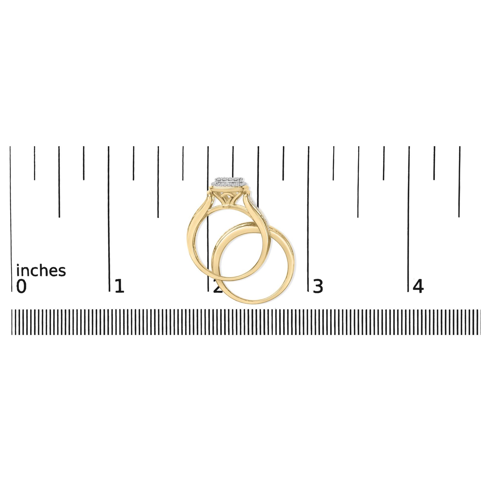 Top-down view of two yellow and white metal rings shown on a scale. One ring features multiple small round white gemstones in a prong setting on the top.