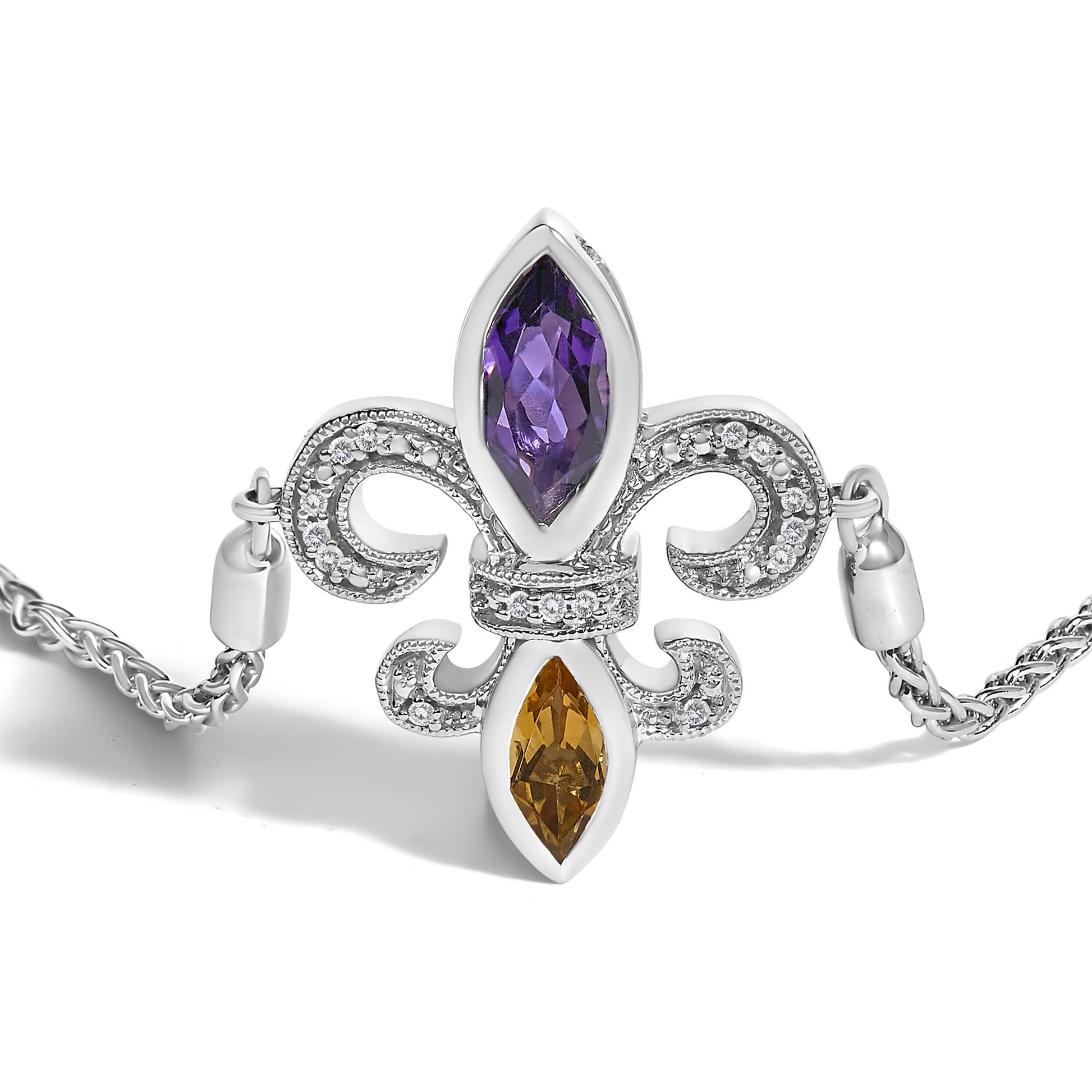 White metal bracelet with an ornate fleur-de-lis design featuring two marquise-shaped bezel-set purple and orange gemstones and multiple small pave-set white gemstones, shot from a front angle on a white background.