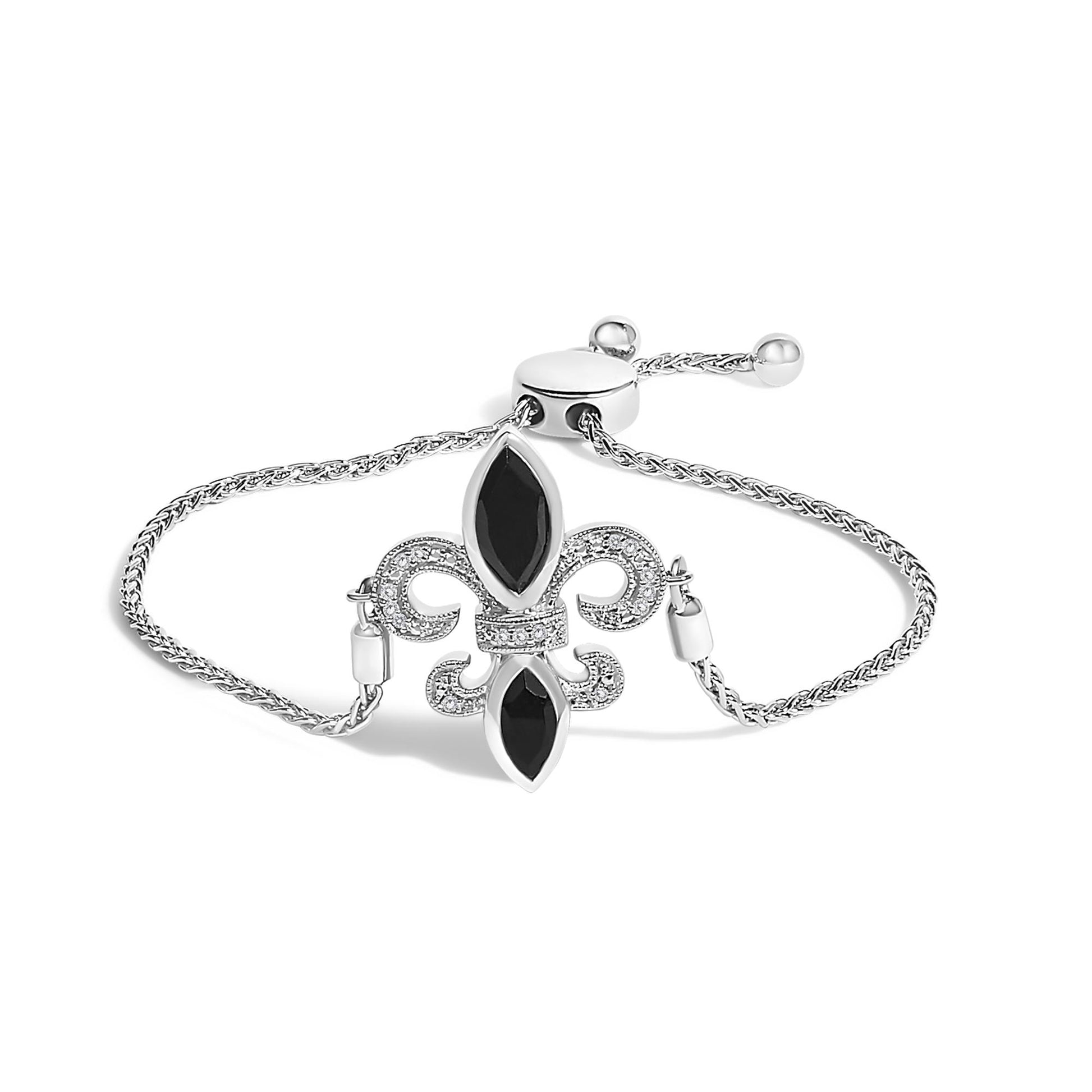 White metal bracelet with two black marquise-shaped gemstones and surrounding small white round gemstones, shown from front angle on a white background.