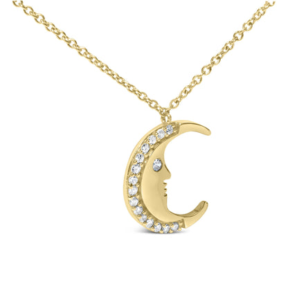 Yellow metal necklace with a crescent moon pendant featuring a face profile and white gemstones along the edge and as an eye, shown from the front angle.