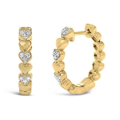 Close-up front and side view of gold vermeil mini heart hoops with alternating smooth and pave-set gemstone hearts on white