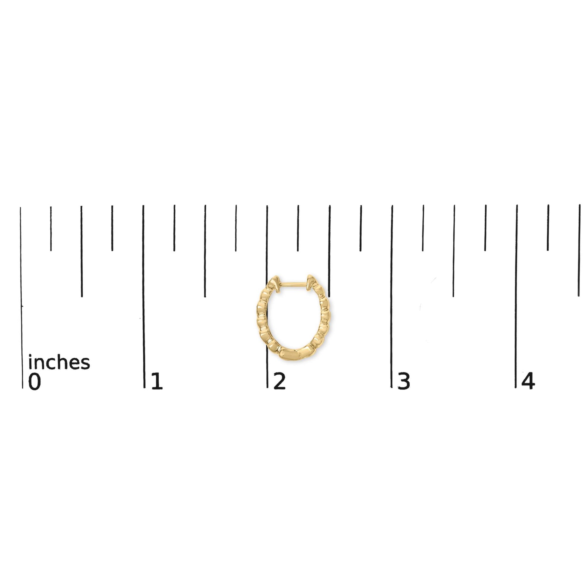 Front view of gold vermeil mini heart hoop earring showcasing pave-set diamond accents, photographed on an inch ruler for scale