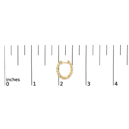 Front view of gold vermeil mini heart hoop earring showcasing pave-set diamond accents, photographed on an inch ruler for scale