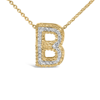 Close-up front view of a yellow necklace with a letter-shaped pendant adorned with white round gemstones in prong settings.
