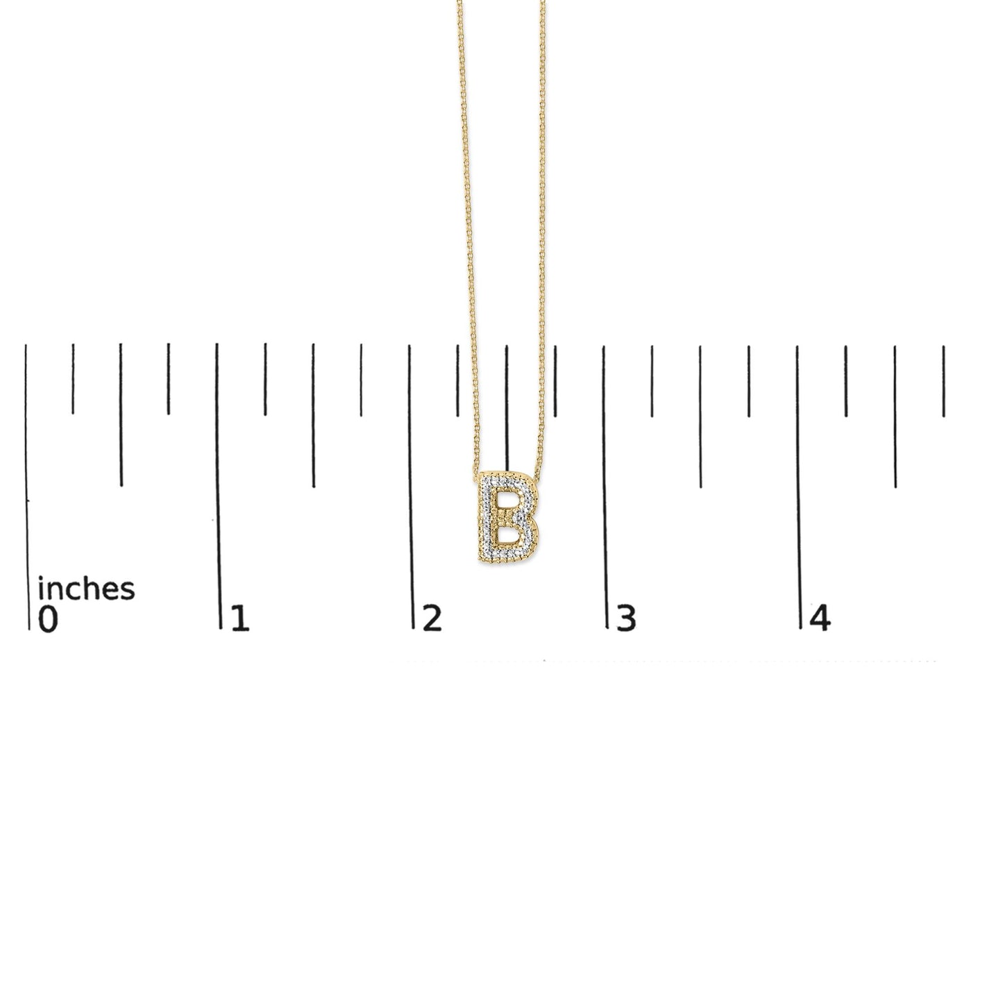 Close-up front view of a yellow necklace pendant shaped like the letter B, adorned with white gemstones in a prong setting, shown on a scale.