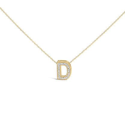 Close-up front view of a yellow metal necklace with a pendant shaped like the letter D outlined with white gemstones in prong settings.