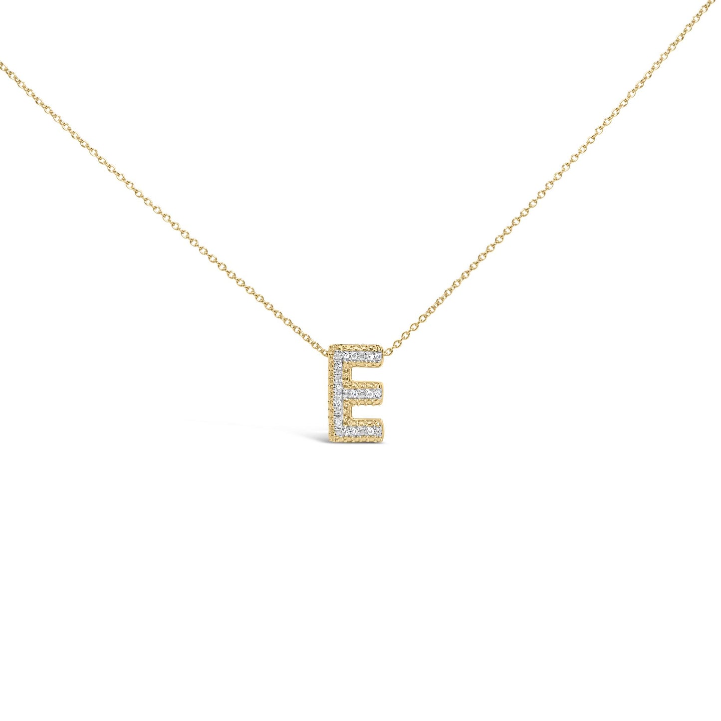 Close-up front view of a yellow metal necklace with a pendant shaped like the letter E, adorned with round white gemstones in a prong setting.