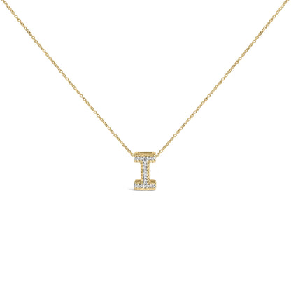 Close-up front view of a yellow necklace with a pendant shaped like the letter 'I' adorned with round white gemstones in a prong setting.