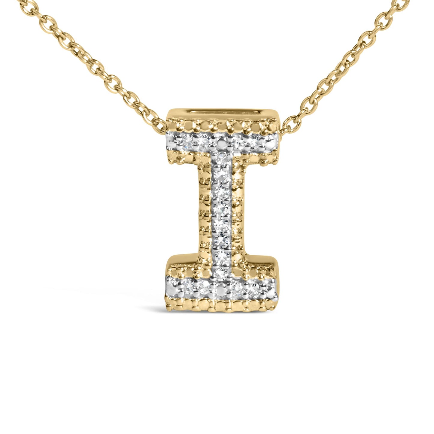 Close-up front view of a yellow metal necklace with a pendant shaped like the letter 'I' featuring white round gemstones in a prong setting along the center.
