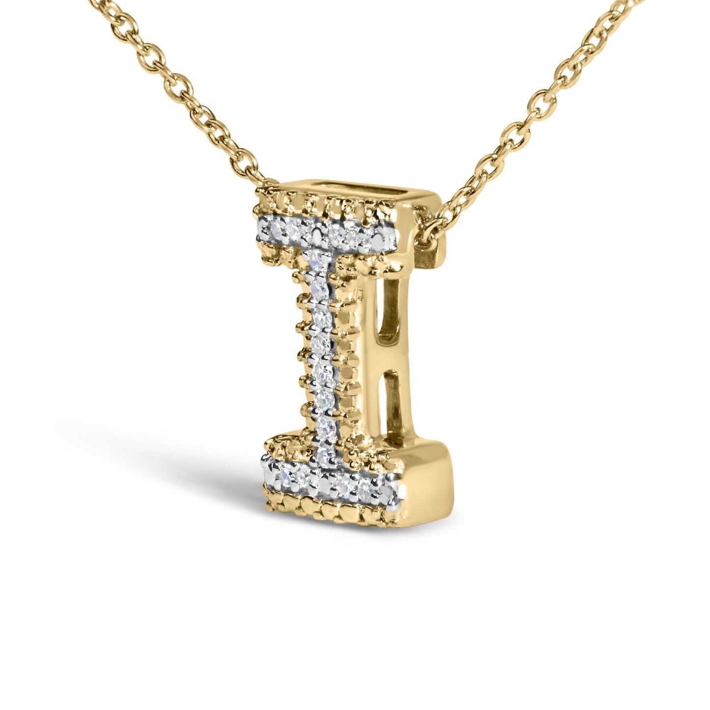 Close-up front angle of a yellow metal necklace pendant in the shape of the letter 'L,' adorned with multiple white gemstones in prong settings along the front surface.
