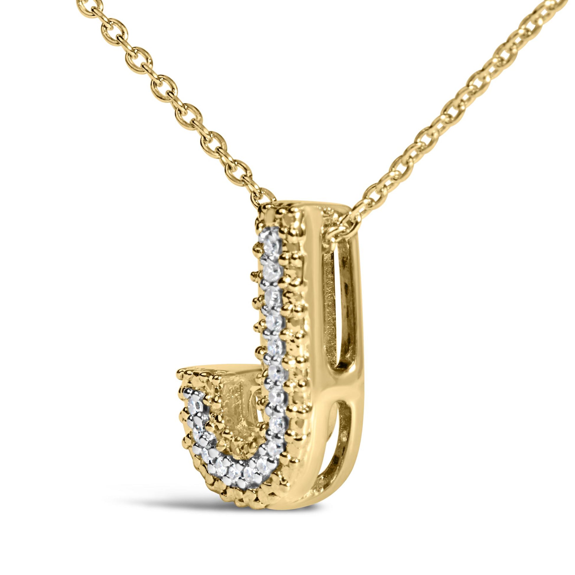 Close-up front angle of a yellow necklace pendant adorned with round white gemstones in prong settings, connected to a matching yellow chain.
