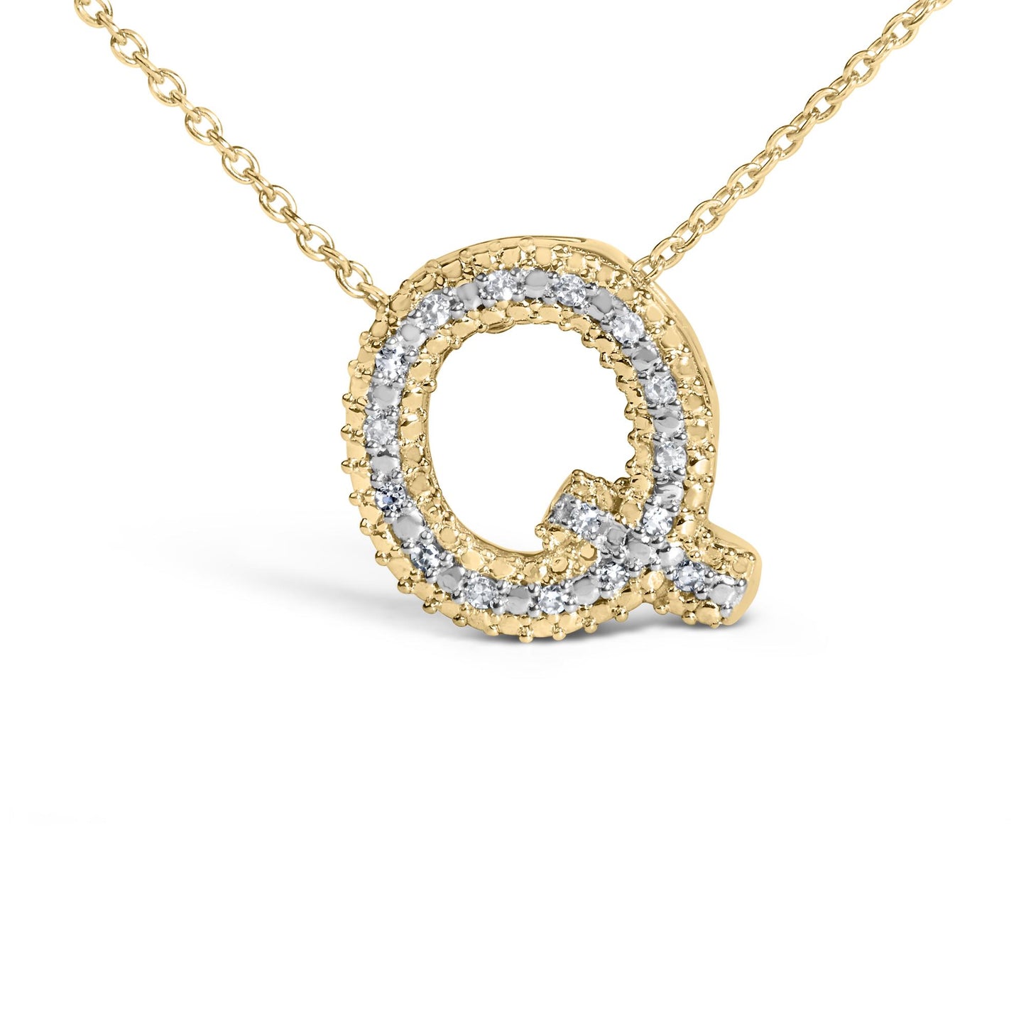 Close-up front angle of a yellow necklace pendant in the shape of the letter Q, adorned with round white gemstones in a prong setting along the outline.