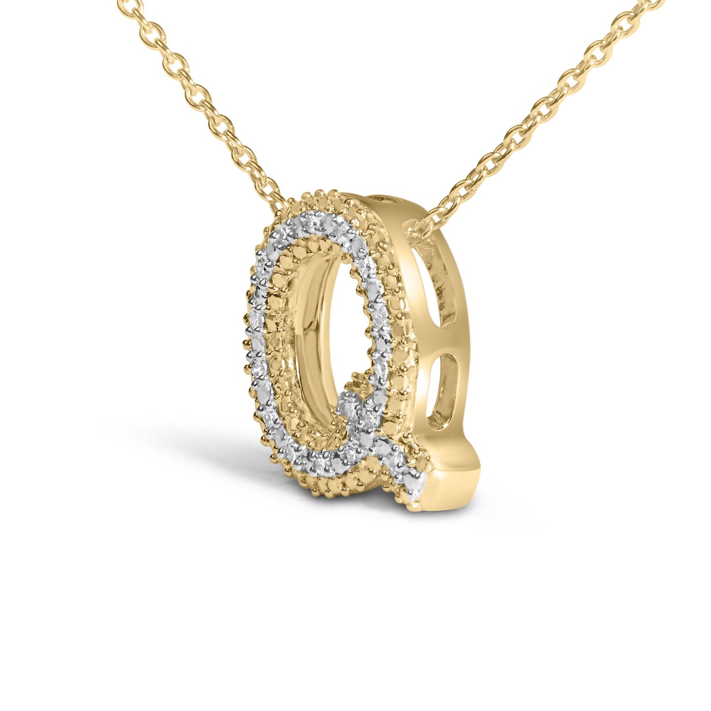 Close-up front angle of a yellow metal necklace pendant with an oval shape decorated with multiple round white gemstones in prong settings along the inner loop, shown on a white background.