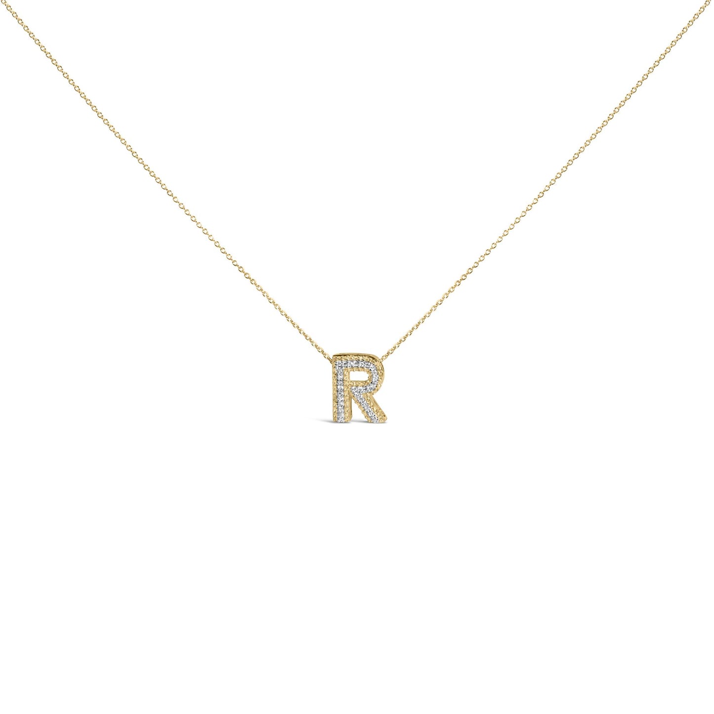 Front view of a yellow necklace with a pendant shaped as the letter 'R' adorned with round white gemstones in a prong setting.