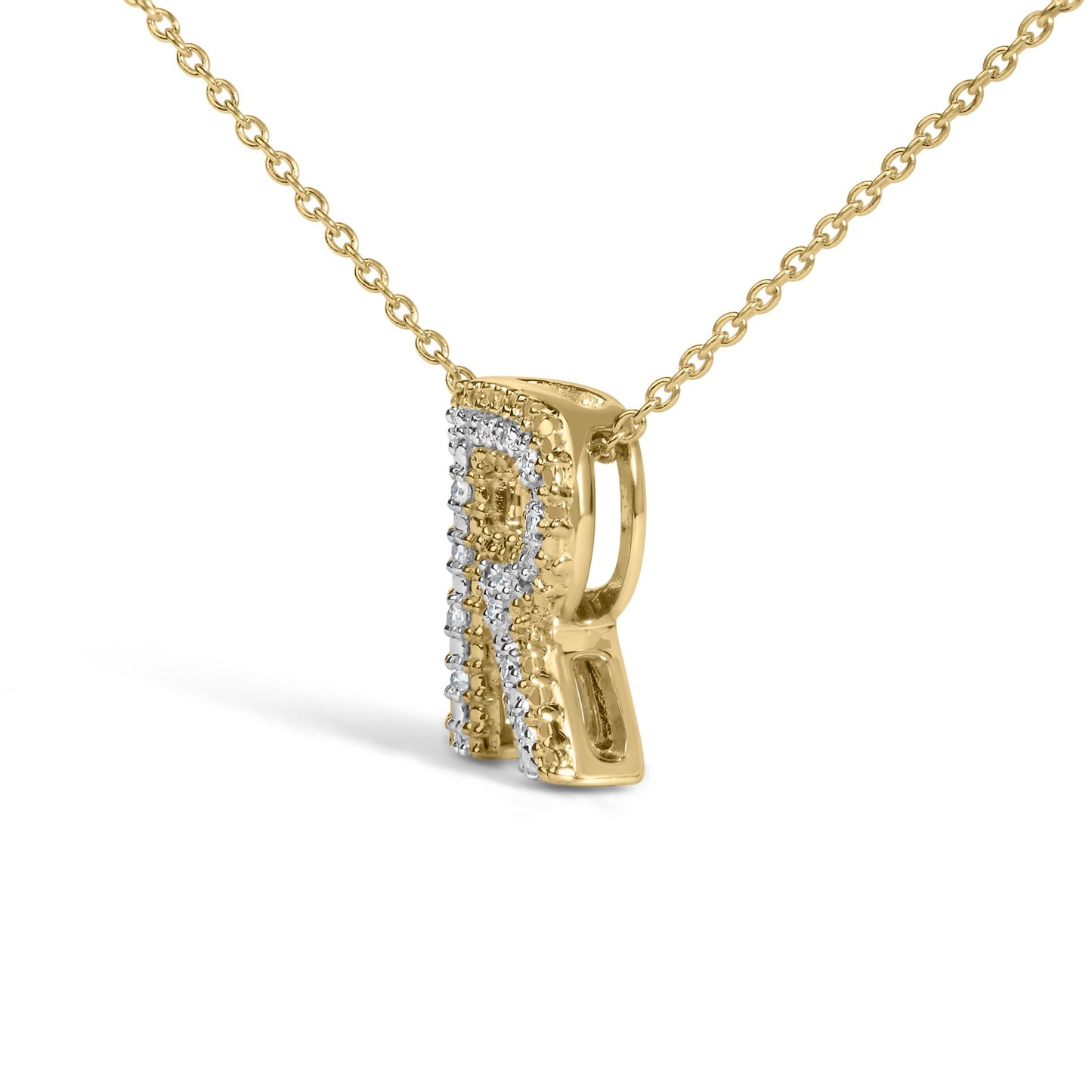 Close-up angled side view of a yellow necklace pendant featuring multiple small white gemstones in prong settings, shown against a white background.