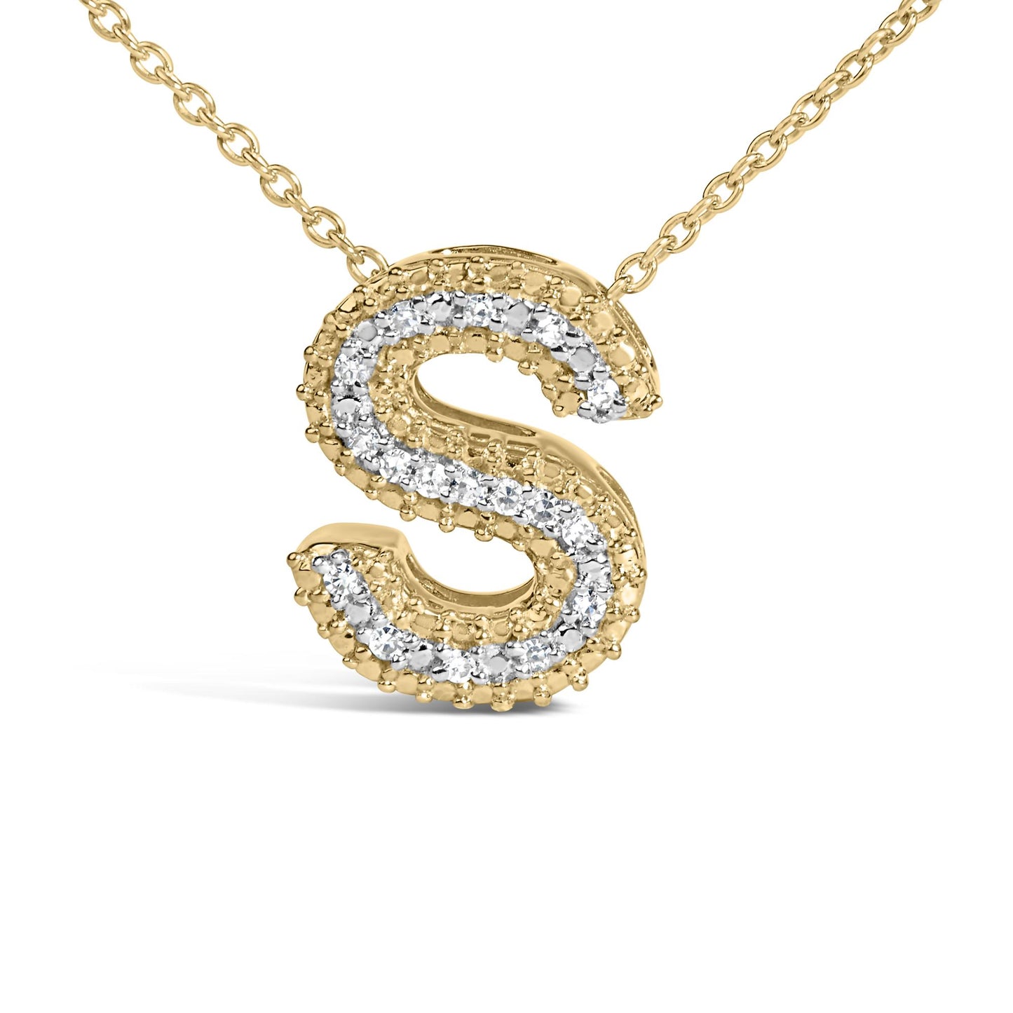 Close-up front view of a yellow metal necklace pendant in the shape of the letter 'S' accented with white round gemstones in prong settings.