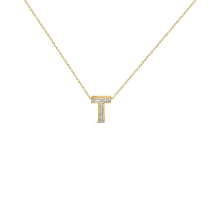Close-up front view of a yellow metal necklace with a T-shaped pendant accented with small round white gemstones in prong settings.