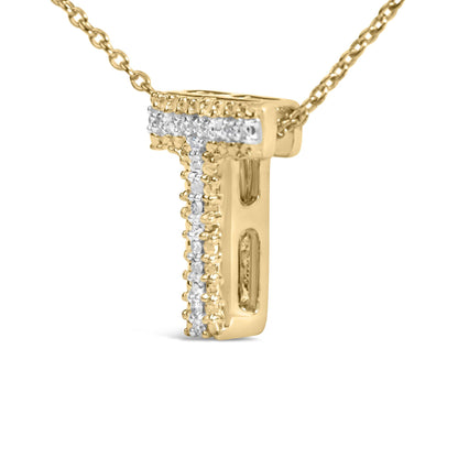 Close-up angled view of a yellow metal necklace pendant with a vertical row of white round gemstones set in prongs on the front.