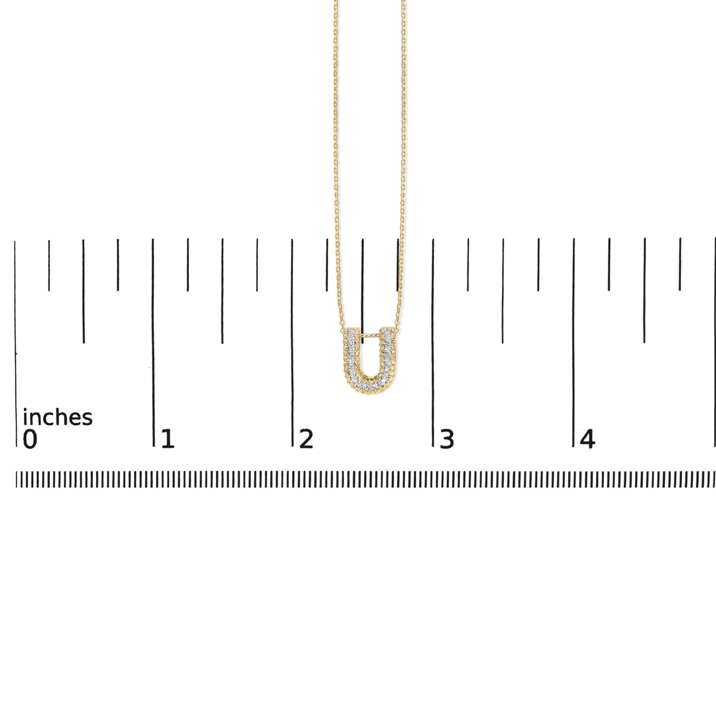 Yellow necklace with a U-shaped pendant adorned with white gemstones in a prong setting, shown on a scale from a front angle.
