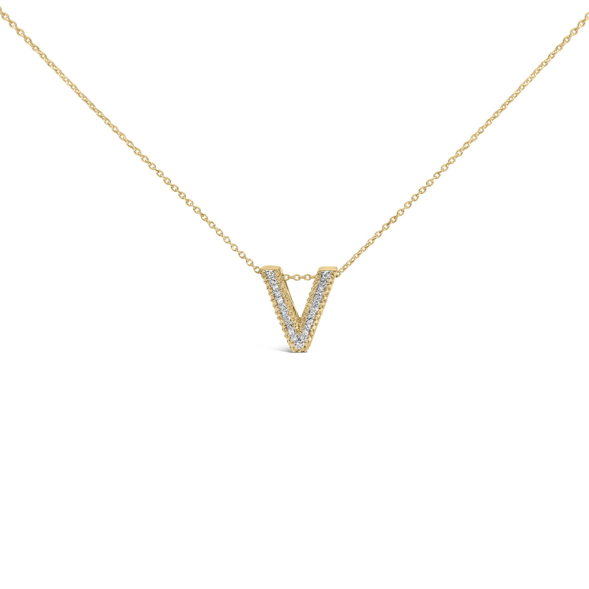 Close-up front view of a yellow necklace with a V-shaped pendant lined with white round gemstones in prong settings.
