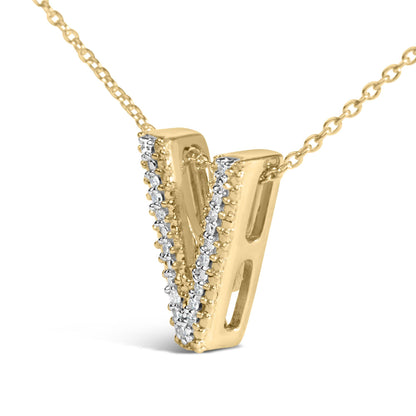 Close-up front angle of a yellow metal necklace pendant shaped like the letter 'V' adorned with vertical rows of small round white gemstones in prong settings.