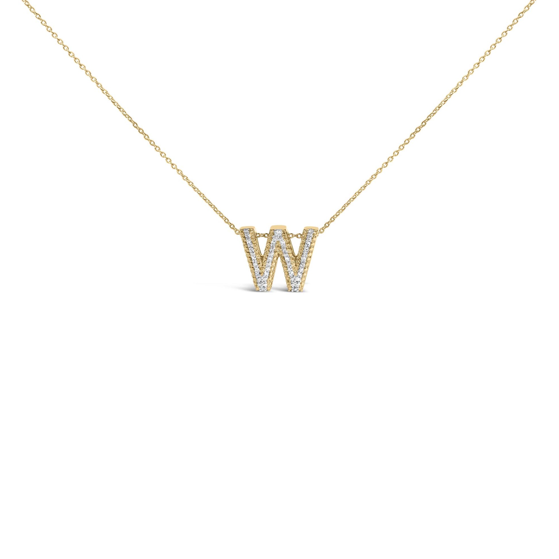 Close-up front view of a yellow metal necklace with a pendant shaped like the letter W, embellished with small white gemstones in prong settings.