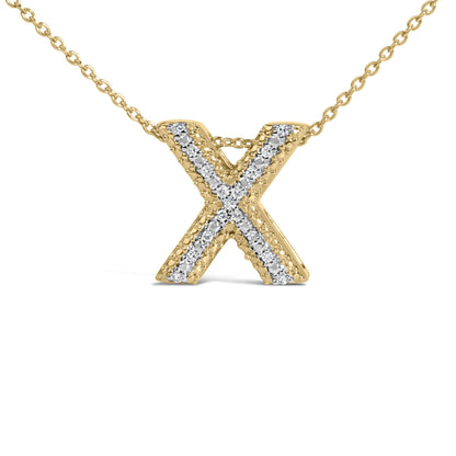 Close-up front view of a yellow metal necklace with an X-shaped pendant adorned with white round gemstones in a prong setting.