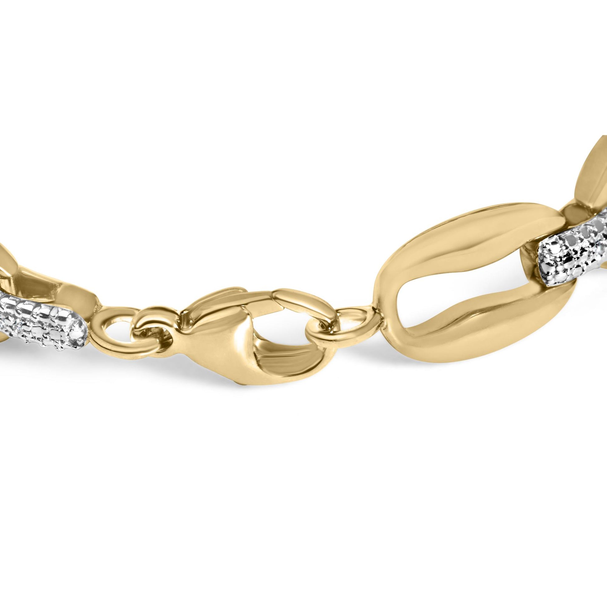 Close-up angled view of a yellow bracelet featuring elongated links with several links adorned with round white gemstones in a pave setting.