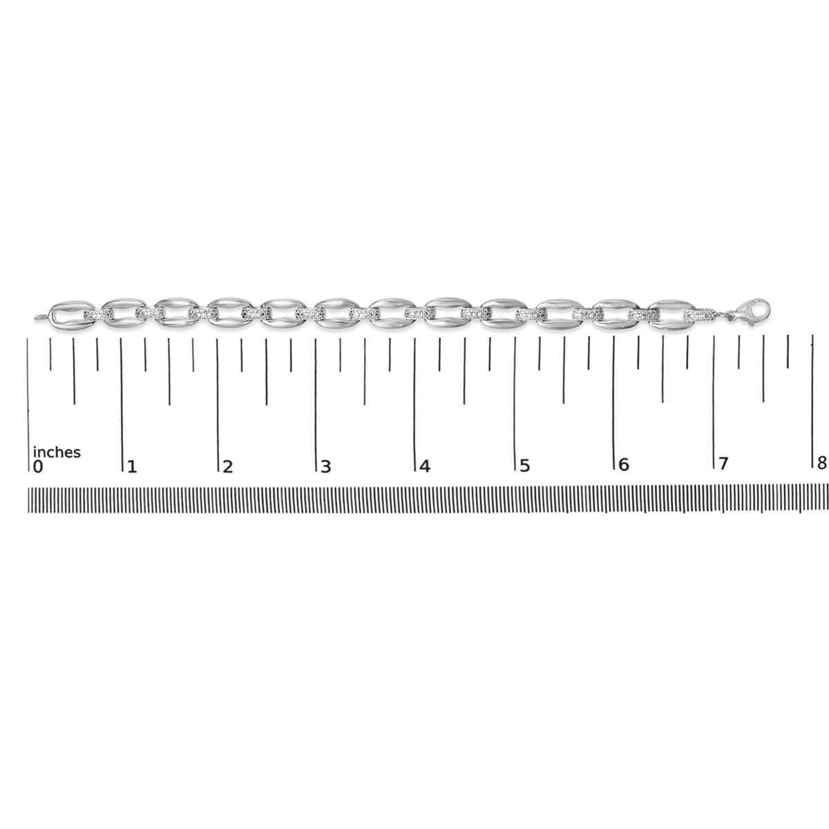 Bracelet with alternating smooth and pave-set white gemstone links in a white metal, shown on a ruler scale, photographed from a top-down angle.