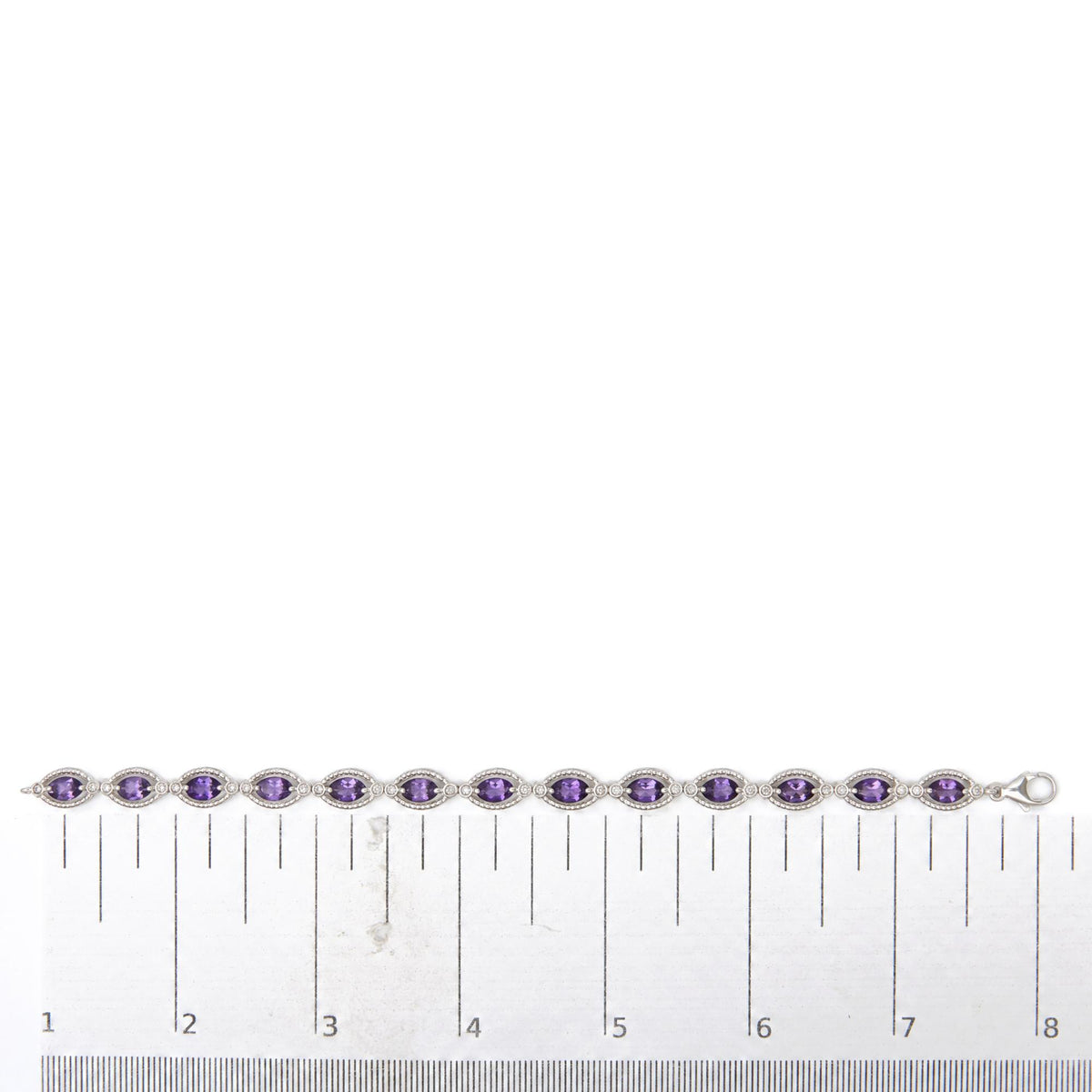 Sterling Silver Oval Purple Amethyst and 1/10 Cttw Diamond Link Bracelet
