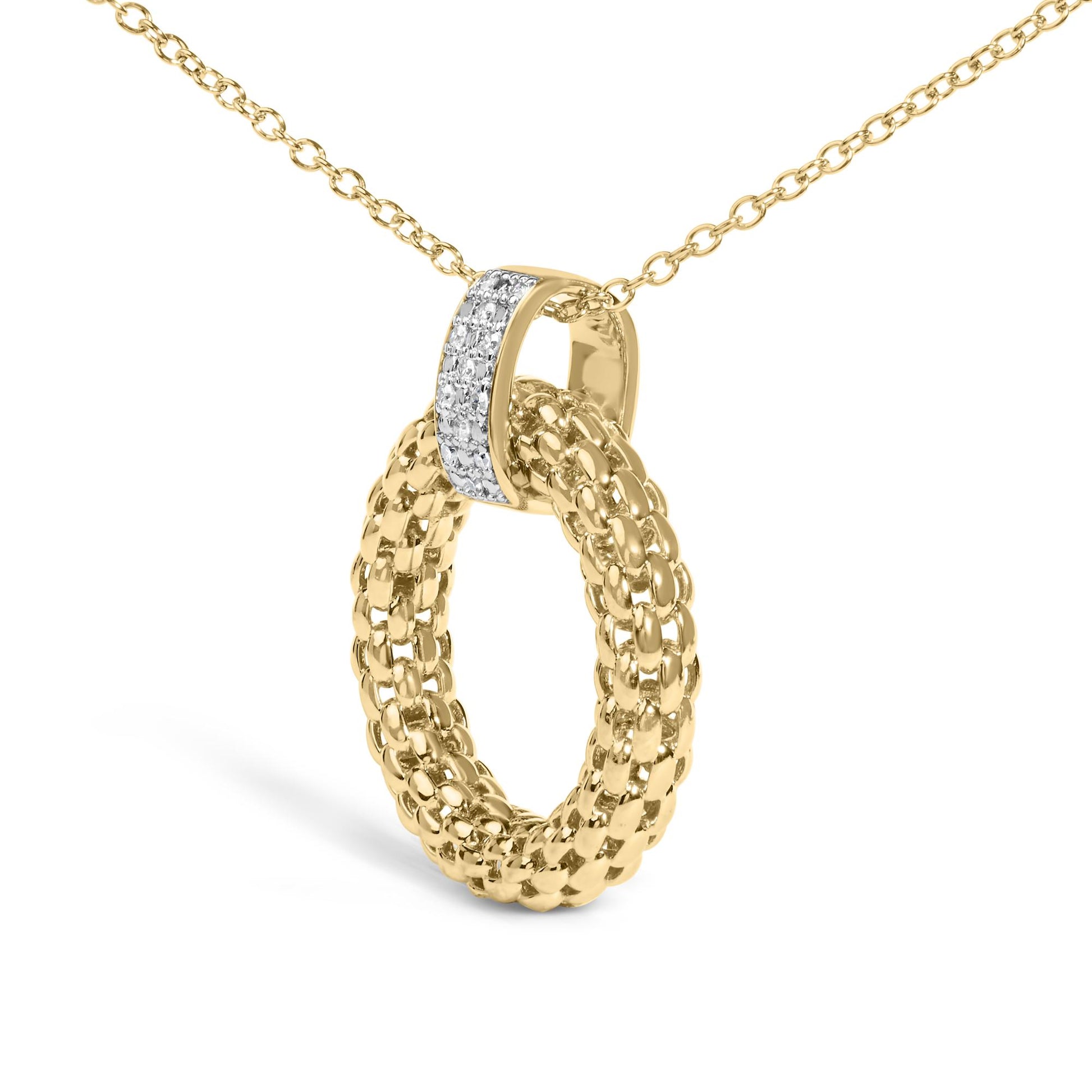 Front close-up of gold vermeil pendant necklace showcasing braided hoop pendant and diamond pave bail on white background