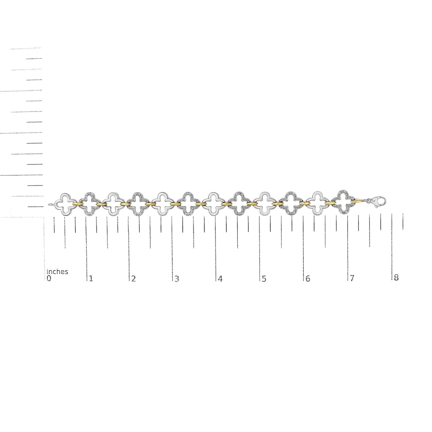 Bracelet with alternating yellow and white metal clover-shaped links, white gemstones in pave setting on white metal, shown flat on a scale from above.