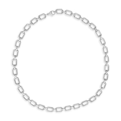 Close-up image of a white metal necklace with rectangular links, some links featuring pave-set white gemstones, shown laid flat against a white background in a top-down view.