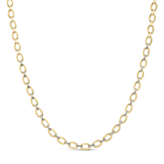 Close-up front angle of a yellow metal chain necklace with alternating links, some set with small white gemstones in a pave setting.